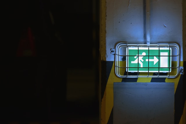 green warehouse exit sign